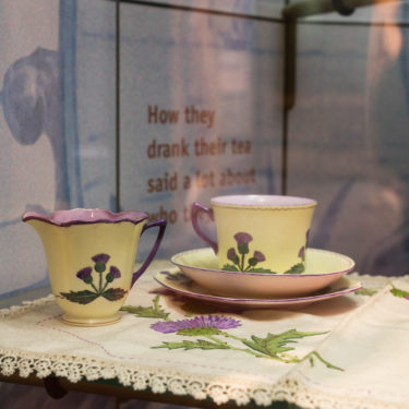 Image: Teacups and cloth with Scottish Thistle pattern